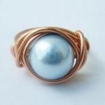 Light Blue Swarovski Pearl ..